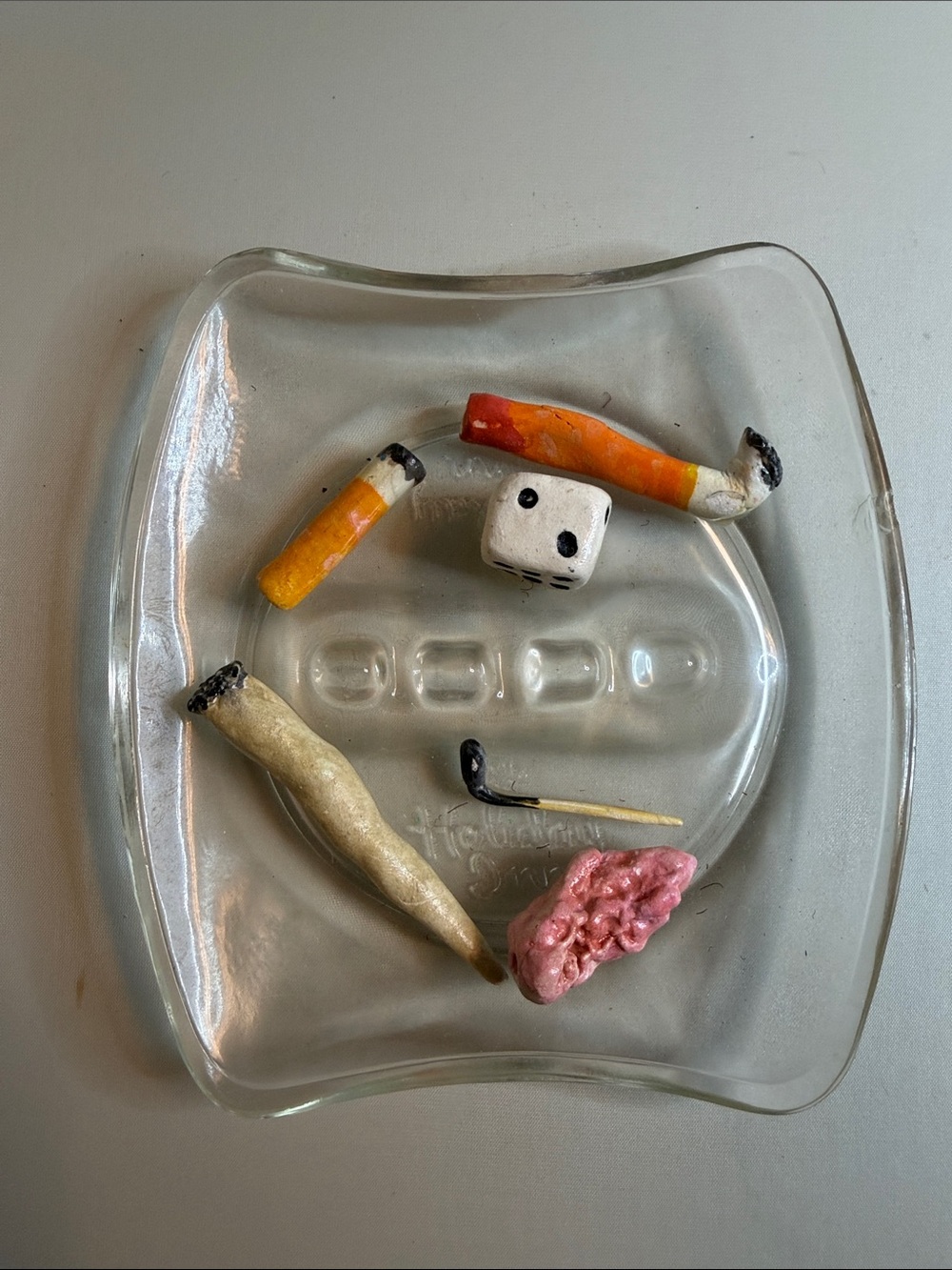 Vintage Holiday Inn glass ashtray with resin butts gum dice art